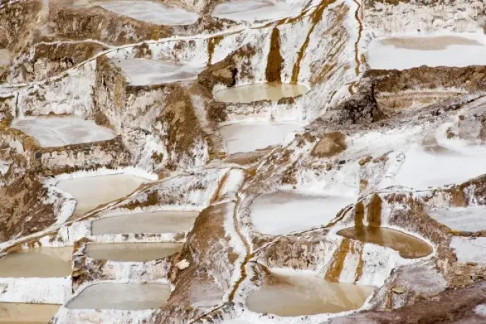 Framed Print : South America - Peru. Salt ponds near Maras where the salt water evaporates and salt