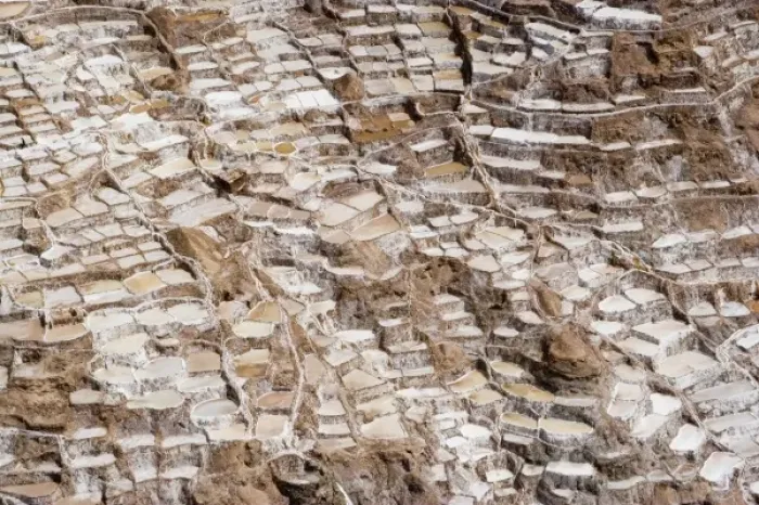 Framed Print : South America - Peru. Salt ponds near Maras where the salt water evaporates and salt