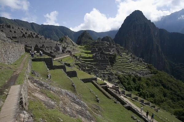 South America - Peru. View of the lost Inca city of Machu Picchu. Huayna Picchu in background