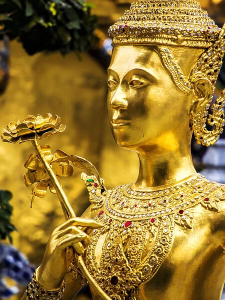 South East Asia; Thialand; Bangkok; Golden Kinnara statue at Emerald Buddha Temple