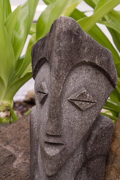 South Pacific, French Polynesia, Society Islands, Moorea. Detailof stone tiki face
