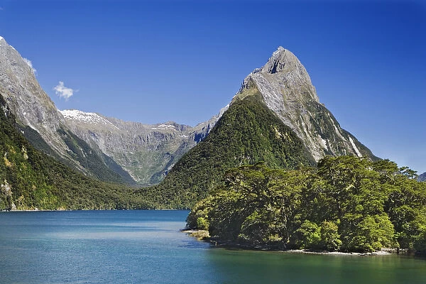 South Pacific, New Zealand, South Island, Milford Sound. Mitre Peak next to peaceful lake