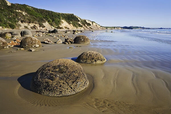 South Pacific, New Zealand, South Island. View of round rocks at Moeraki Boulders Scenic Reserve