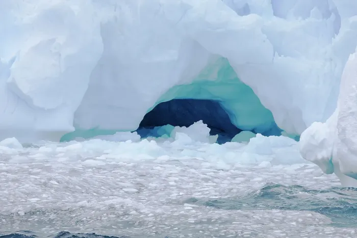 Framed Print : Southern Ocean, Antarctica. Beautiful blue and purple colors in the ice are exposed by the erosion of the tabular berg