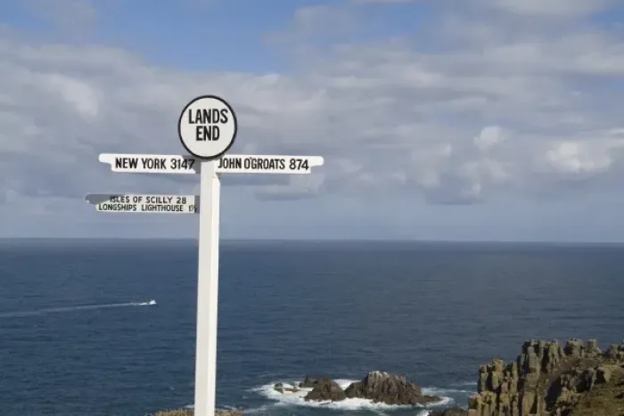 Framed Print : Southernmost tip of England Lands End in Cornwall sign of distances on cliff Framed Print : Southernmost tip of England Lands End in Cornwall sign of distances on cliff