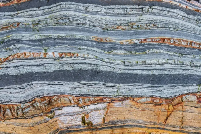 Framed Print : Spain, Barrika. Contorted rock layers on beach