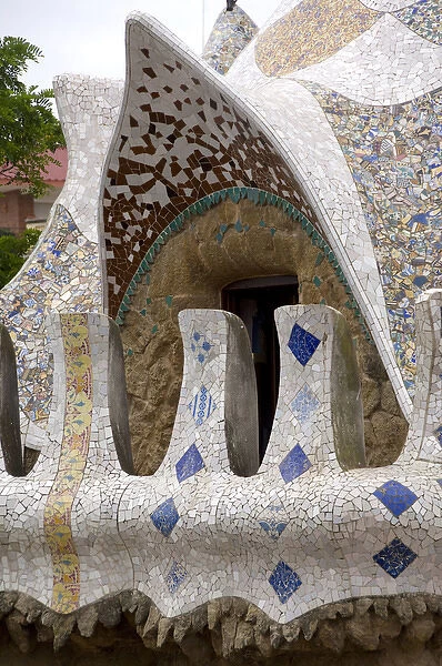 Spain, Catalonia, Barcelona. Gaudis Parc Guell, park entry pavillion using fragmented pottery