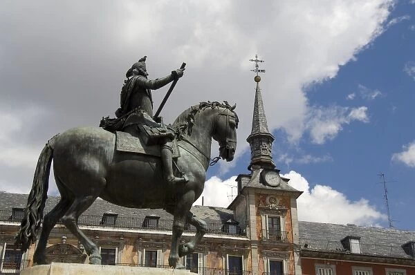 Spain, Madrid. Plaza Mayor, statue of King Philip III, bakers guild house (aka Casa