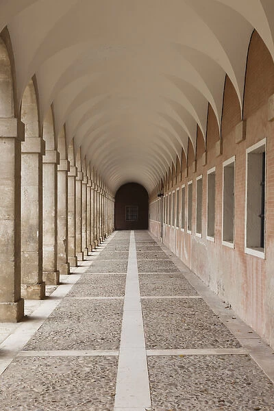Spain, Madrid Region, Aranjuez, The Royal Palace at Aranjuez, arched walkway