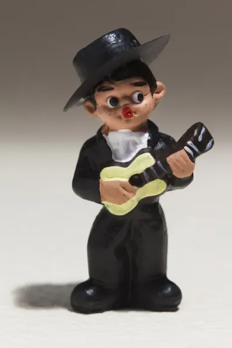 Framed Print : Spain, Madrid, souvenir miniature figurine of Spanish musician