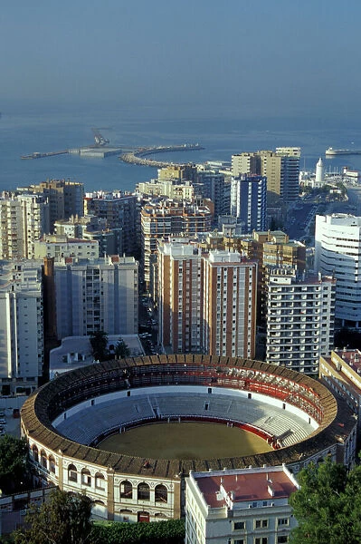 Spain, Malaga, Andalucia View of Plaza de Toros (bullring) and cruise ship in harbor