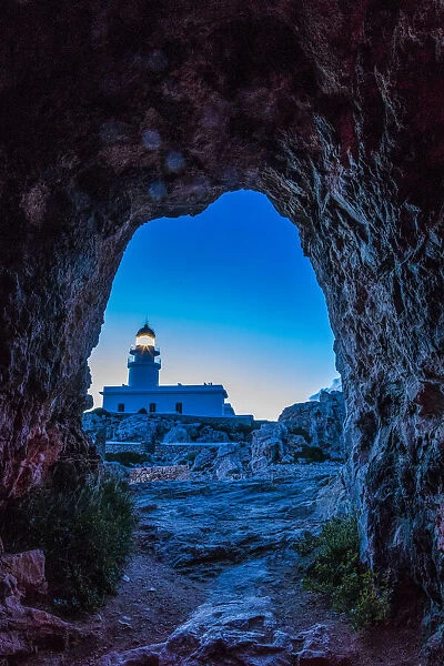 Spain, Menorca. Lighthouse at Cavalleria at sunrise
