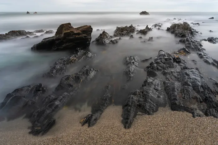 Framed Print : Spain, Playa de Portizuelo. Rock formations on ocean shore Framed Print : Spain, Playa de Portizuelo. Rock formations on ocean shore
