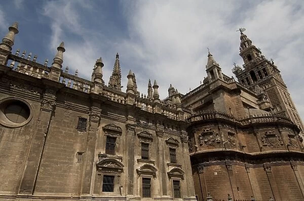 Spain, Seville. Gothic Seville Cathedral & La Giralda Renaissance bell tower