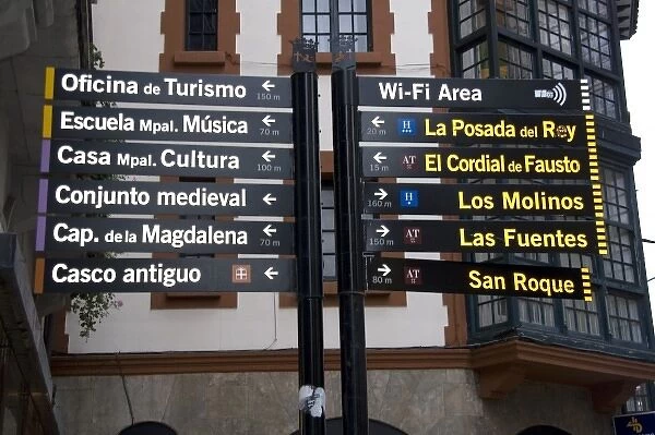 Spanish language direction sign in the town of Llanes, Spain