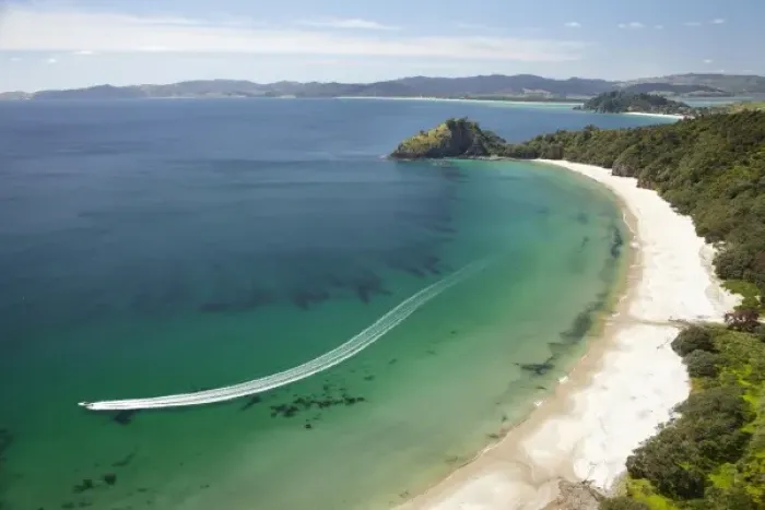 Framed Print : Speed Boat, New Chums Beach, Coromandel Peninsula, North Island, New Zealand - aerial