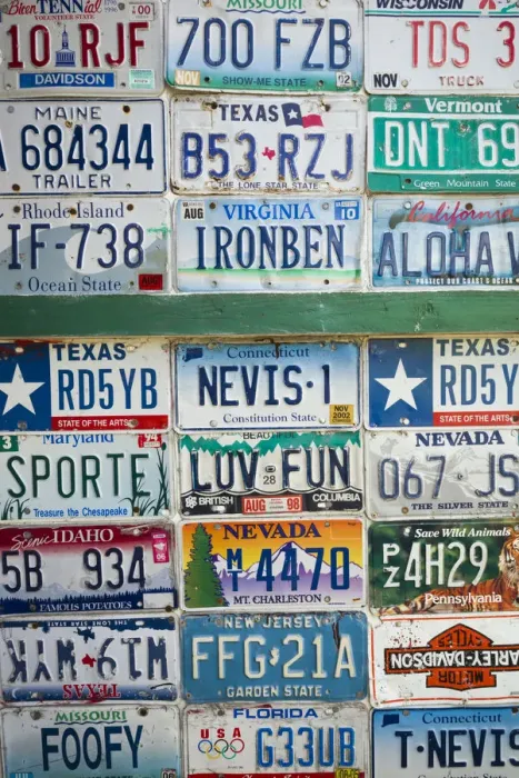 Framed Print : St. Kitts and Nevis, Nevis. Pinneys Beach, license plates