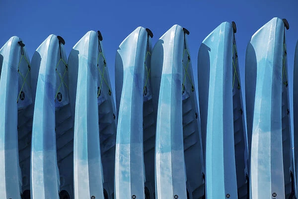 Stacked kayaks on a beach, Florida, USA