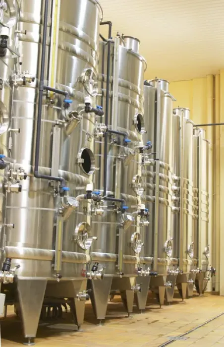 Framed Print : Stacks of stainless steel fermentation vats in various sizes and with cooling systems Framed Print : Stacks of stainless steel fermentation vats in various sizes and with cooling systems