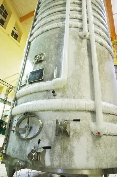 Framed Print : A stainless steel fermentation tank with still wine undergoing cold stabilization Framed Print : A stainless steel fermentation tank with still wine undergoing cold stabilization