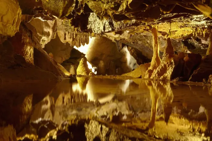 Framed Print : Stalactites and stalagmites reflected in pool, Goughs Cave, Cheddar Caves, Somerset