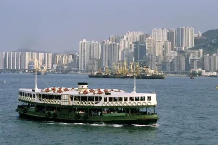 Framed Print : Star Ferry and skyscraper buildings at Hong Kong Harbor Framed Print : Star Ferry and skyscraper buildings at Hong Kong Harbor