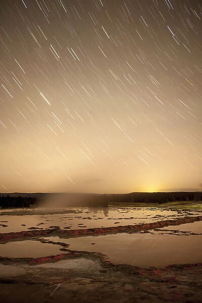 Startrails over active geyser. Fire Hole. Yellowstone National Park. Wyoming
