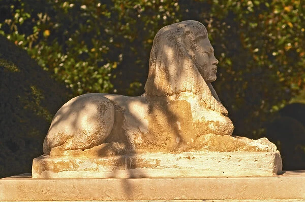 Statue of a Sphynx (sfinx) at the entrance to the park at Chateau Mouton Rothschild