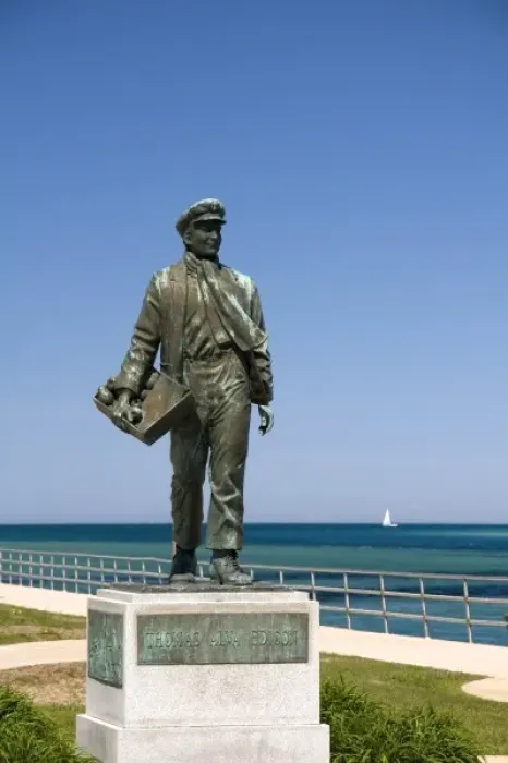 Framed Print : A statue of Thomas Edison by local artist Mino Duffy along the St. Clair River at Port Huron Framed Print : A statue of Thomas Edison by local artist Mino Duffy along the St. Clair River at Port Huron