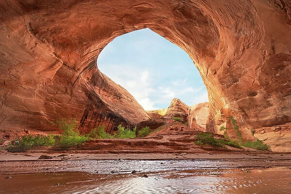 Steam flowing through giant alcove adjacent to Jacob Hamblin Arch in Coyote Gulch, Glen Canyon National Recreation Area, Utah