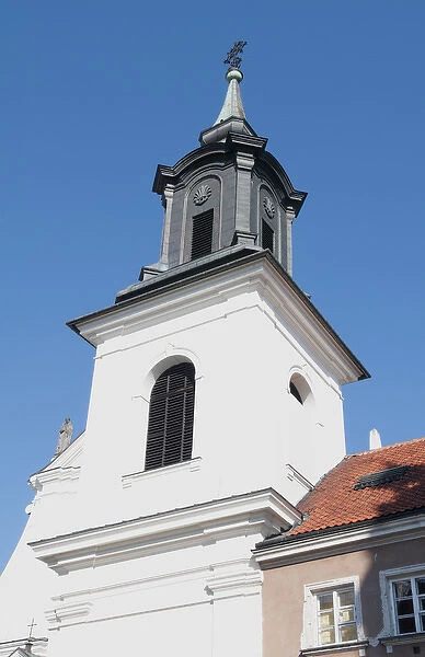 Steeple of church in Old Town for tourists Central Warsaw Poland Freta Street