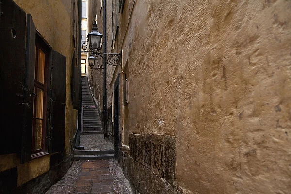 Stockholm, Sweden - A narrow alley leading to a staircase going between two old world buildings