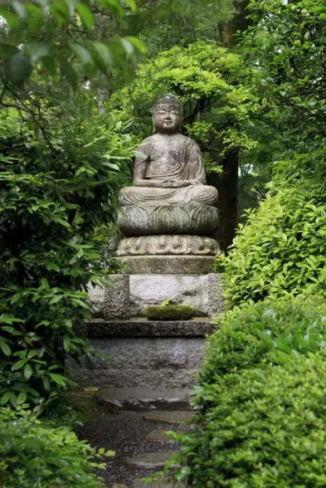 Framed Print : A stone Buddha statue in the grounds of Ryoan-Ji Temple in Kyoto, Japan