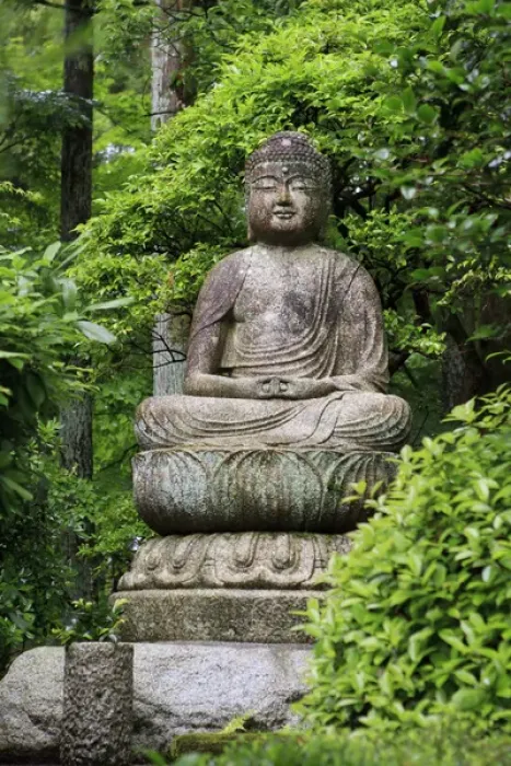 Framed Print : A stone Buddha statue in the grounds of Ryoan-Ji Temple in Kyoto, Japan