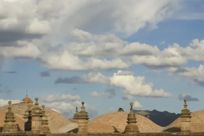 Framed Print : Stone roofs under puffy clouds, Cuzco, Peru Framed Print : Stone roofs under puffy clouds, Cuzco, Peru