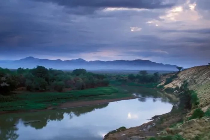 Framed Print : A stormy morning, with threatening clouds hanging in the air over the Omo River