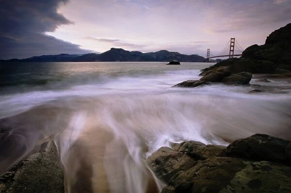 A stormy view of the Golden Gate Bridge from Baker Beach