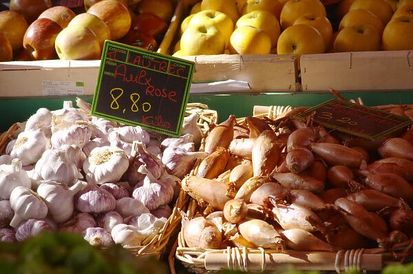 Street market merchants stall with garlic and shallot onions Sanary Var Cote