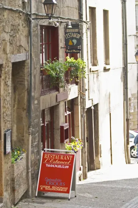 Framed Print : A street scene in Vinenne, a restaurant called lEstancot in the old town, with a sign Framed Print : A street scene in Vinenne, a restaurant called lEstancot in the old town, with a sign