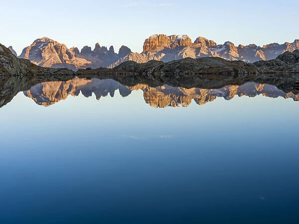 The summits of Brenta mountain range are reflected in Lago Nero