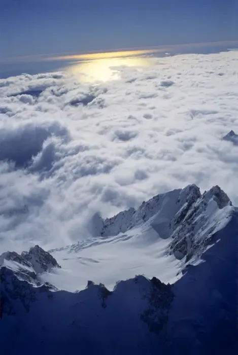Framed Print : Sunlight reflects off the Tasman Sea beneath the jagged peaks of the Southern Alps Framed Print : Sunlight reflects off the Tasman Sea beneath the jagged peaks of the Southern Alps