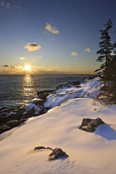 Sunrise over the Atlantic Ocean in winter as seen from near Schooner Head on Maine s