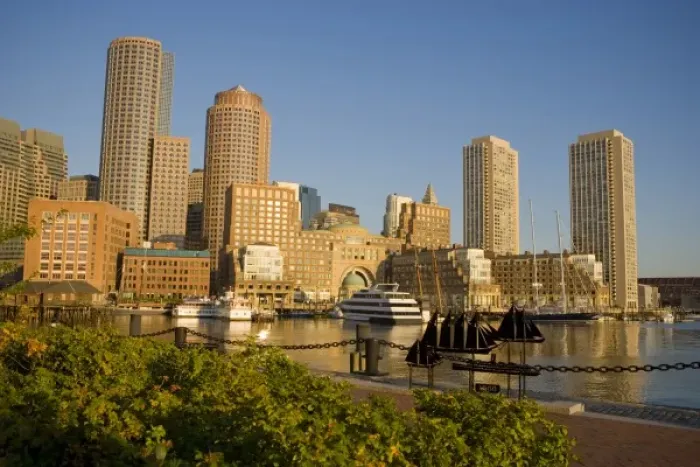 Framed Print : Sunrise on the Boston skyline from along the seawall at John Joseph Moakley Federal Courthouse