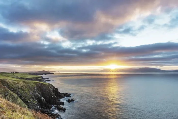 Framed Print : Sunrise over Dingle Bay as fishing boats heads out in County Kerry, Dingle, Ireland Framed Print : Sunrise over Dingle Bay as fishing boats heads out in County Kerry, Dingle, Ireland