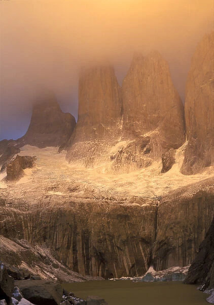 Sunrise glow with clouds at Torres del Paine in the Patagonia region of Chile