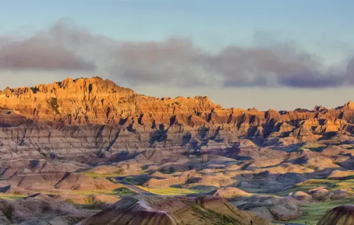 Framed Print : Sunrise light breaks through on a foggy morning in Badlands National Park, South Dakota Framed Print : Sunrise light breaks through on a foggy morning in Badlands National Park, South Dakota