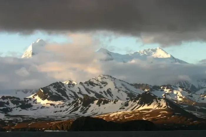 Framed Print : Sunrise over the mountain ranges on South Georgia Island