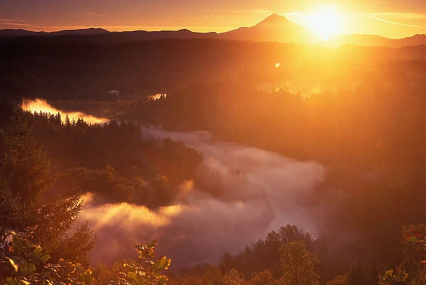 Sunrise over Mt Hood, with the Sandy River covered in fog as seen from Jonsrud Viewpoint near Sandy
