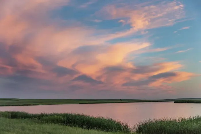 Framed Print : Sunset clouds reflecting at Medicine Lake National Wildlife Refuge, Montana, USA Framed Print : Sunset clouds reflecting at Medicine Lake National Wildlife Refuge, Montana, USA