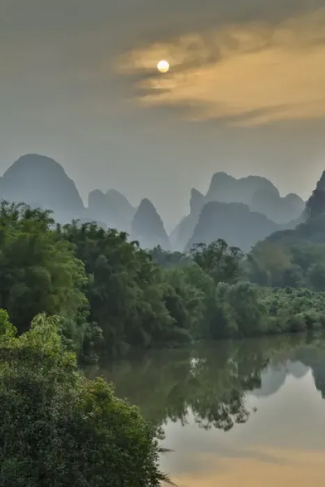 Framed Print : Sunset along the Li River near Yangshuo, China with the layering classic Mountains Framed Print : Sunset along the Li River near Yangshuo, China with the layering classic Mountains